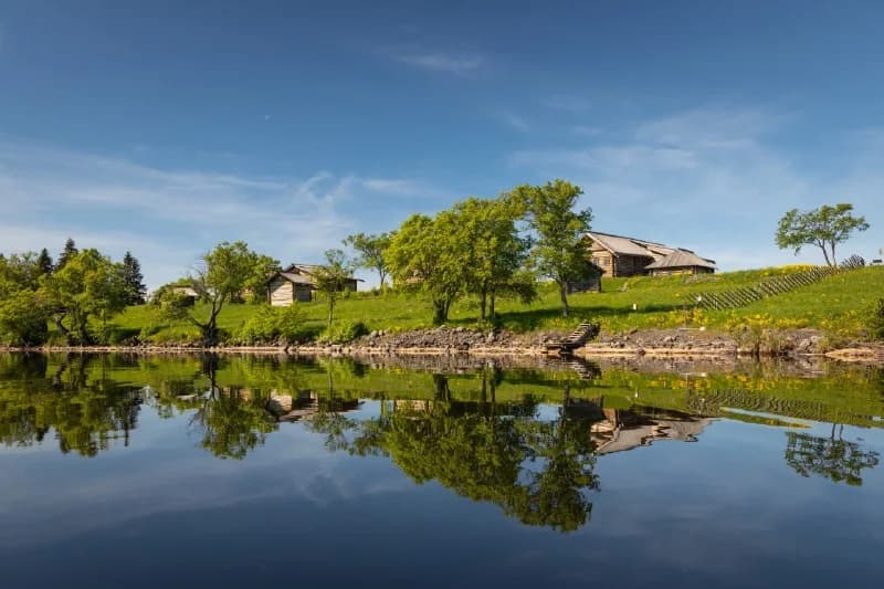 Wooden buildings of Kizhi reflected in the water